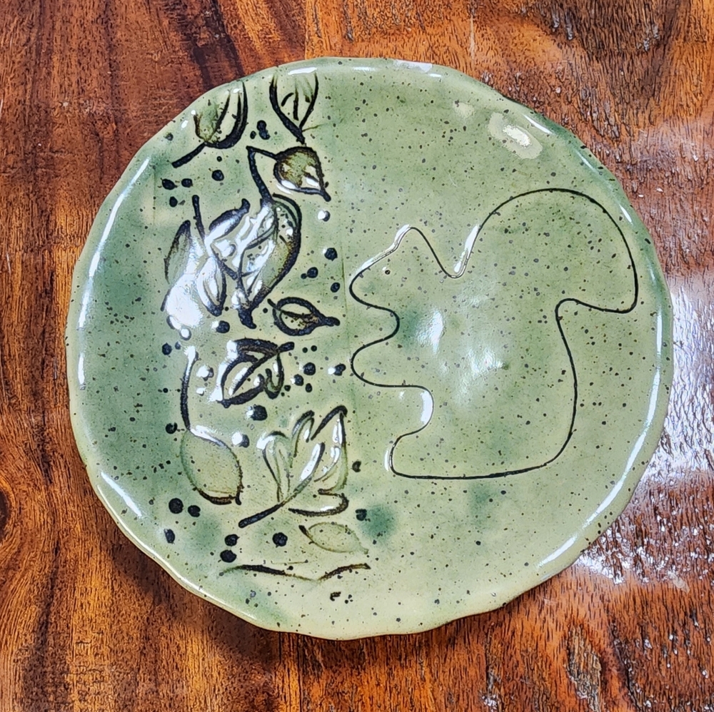 Artistic Green Ceramic Plate with Black Detailing